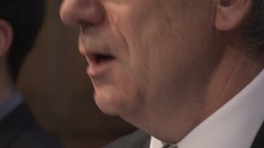 Close up of a man singing in a church choir