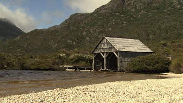 Wooden shelter on the edge of a lake