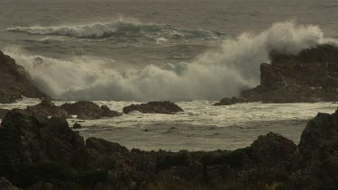 Waves beating against a rocky shore