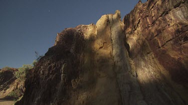 Sunlit rocky cliffs