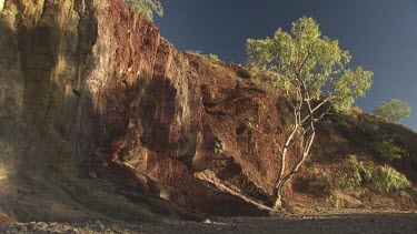 High rocky cliffs against a blue sky