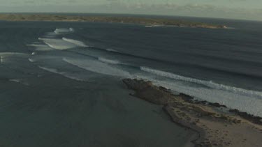 Gentle waves on a sandy beach