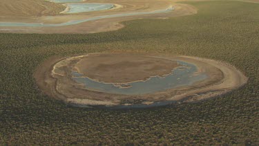 Small lagoons ringed by desert vegetation