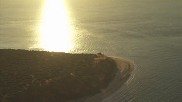 Sunlight along a sandy coast