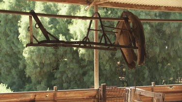 Metal equipment hanging on a beam