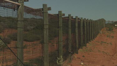 Fence surrounding animal enclosures