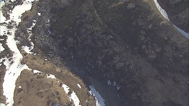River through a snow-covered mountain landscape