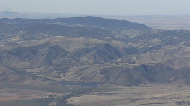 Fog over low hills and mountains