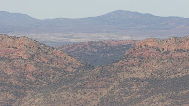 Rocky mountains in the Flinder Ranges against a hazy sky
