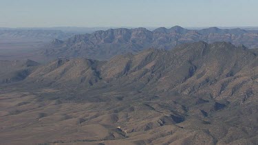 Rocky mountains in the Flinder Ranges against a hazy sky