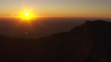 Silhouetted mountain peaks in the Flinder Ranges at sunset