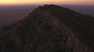 Silhouetted mountain peaks in the Flinder Ranges at sunset