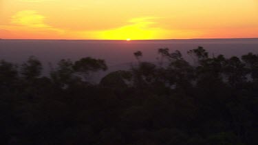 Silhouetted mountain peaks in the Flinder Ranges at sunset