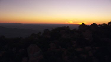 Silhouetted mountain peaks in the Flinder Ranges at sunset