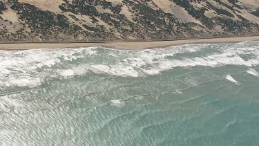 Waves along the sandy coast in Coorong National Park