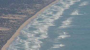 Waves along the sandy coast in Coorong National Park