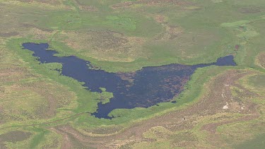 Aerial shot of a bright blue lagoon in Coorong National Park