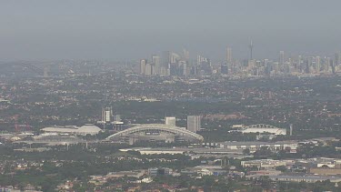 Sydney Olympic Park and the cloudy cityscape