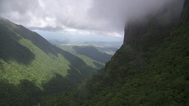 Misty cliffs and horizon in Daintree National Park