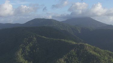 Clouds over forested mountain peaks in Daintree National Park