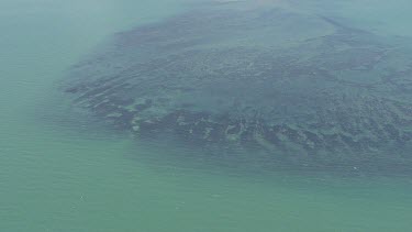 Sand bar and clear blue water in Daintree National Park