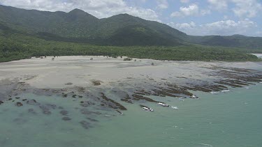 Aerial view of the beach and forested coast in Daintree National Park