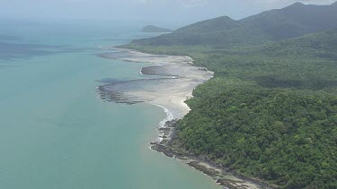 Aerial view of the beach and forested coast in Daintree National Park