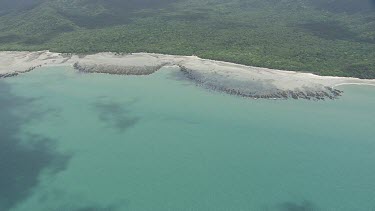 Aerial view of the beach and forested coast in Daintree National Park