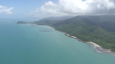 Aerial view of the beach and forested coast in Daintree National Park