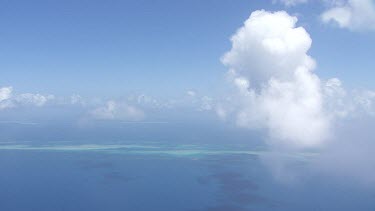 Clouds in a blue sky over the ocean in Daintree National Park