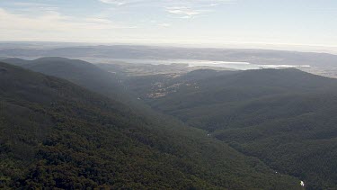 Aerial of Kosciuszko National Park - Dense forest and river landscape