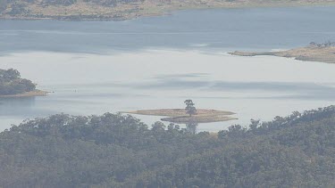 Aerial of Kosciuszko National Park - Dense forest and river landscape