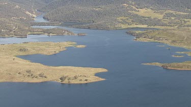 Aerial of Kosciuszko National Park - Dense forest and river landscape