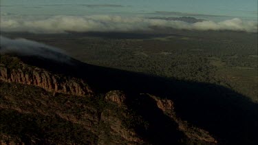 Wilpena Pound aerials of peaks and cliffs clouds on