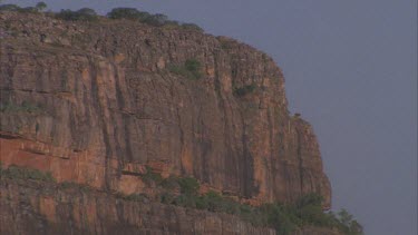 Nourlangie Rock and escarpment from Nawurlandja Lookout vista pan