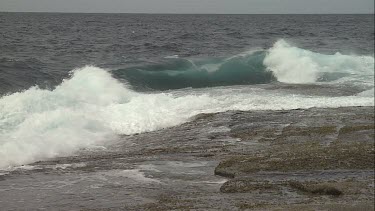 South Australia waves breaking on a rocky shore