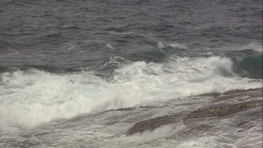 South Australia waves breaking on a rocky shore