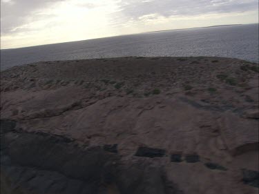 View around a large rock in the ocean