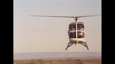 Helicopter flying towards camera, full screen