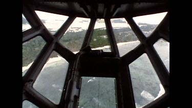 Cargo plane landing interior shot through nose window