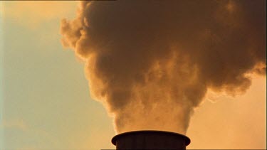 Smoke billoWS from chimney