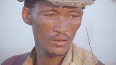 bushmen portrait of face wearing hat