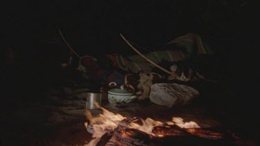 bushman camp at night boy sleeping