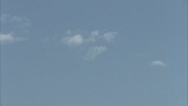 aboriginal spear through air against sky