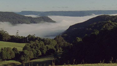 Mist over mountain valley