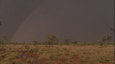 Rainbow over a dry landscape