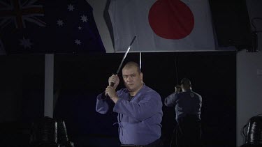 Man whelding Samuri sword_WS_Slo Mo