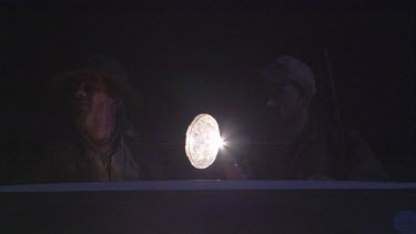truck four wheel drive vehicle dark night spotlight torch searching scanning rangers humans
