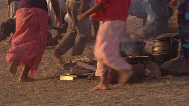 villagers local tribe woman children family clapping dancing rejoicing festivities gathering campfire day