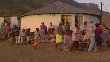 villagers local tribe woman children family clapping dancing rejoicing festivities gathering campfire day